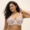 MATILDA_WHITE_UW-PLUNGE-BRA_EL8900_F1_TRADE_3000 Kobieta o pełnych kształtach w białym biustonoszu z fiszbinami z siateczki, z różową taśmą w kropki na dekolcie