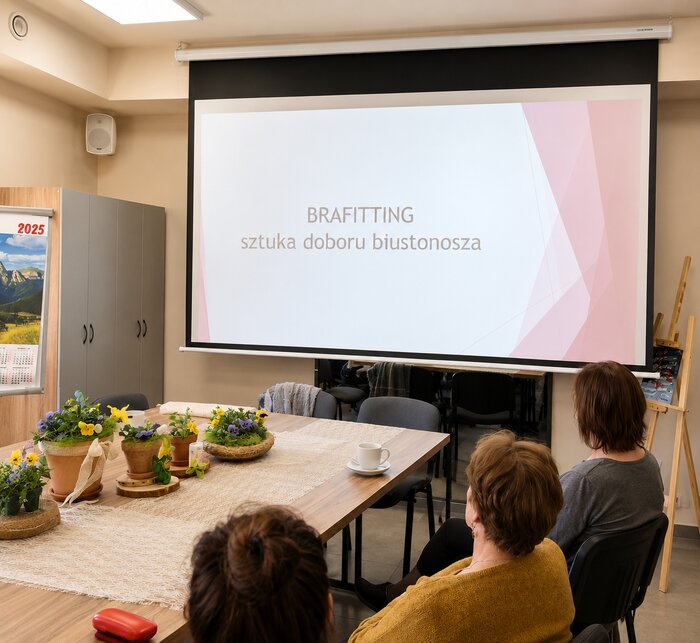 Slajd tytułowy prezentacji „Brafitting - sztuka doboru biustonosza” podczas spotkania